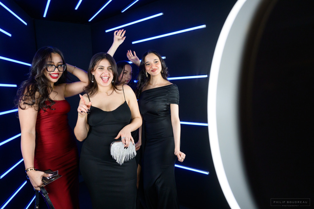 Guests celebrating inside a Memories2Go light-tunnel photo experience