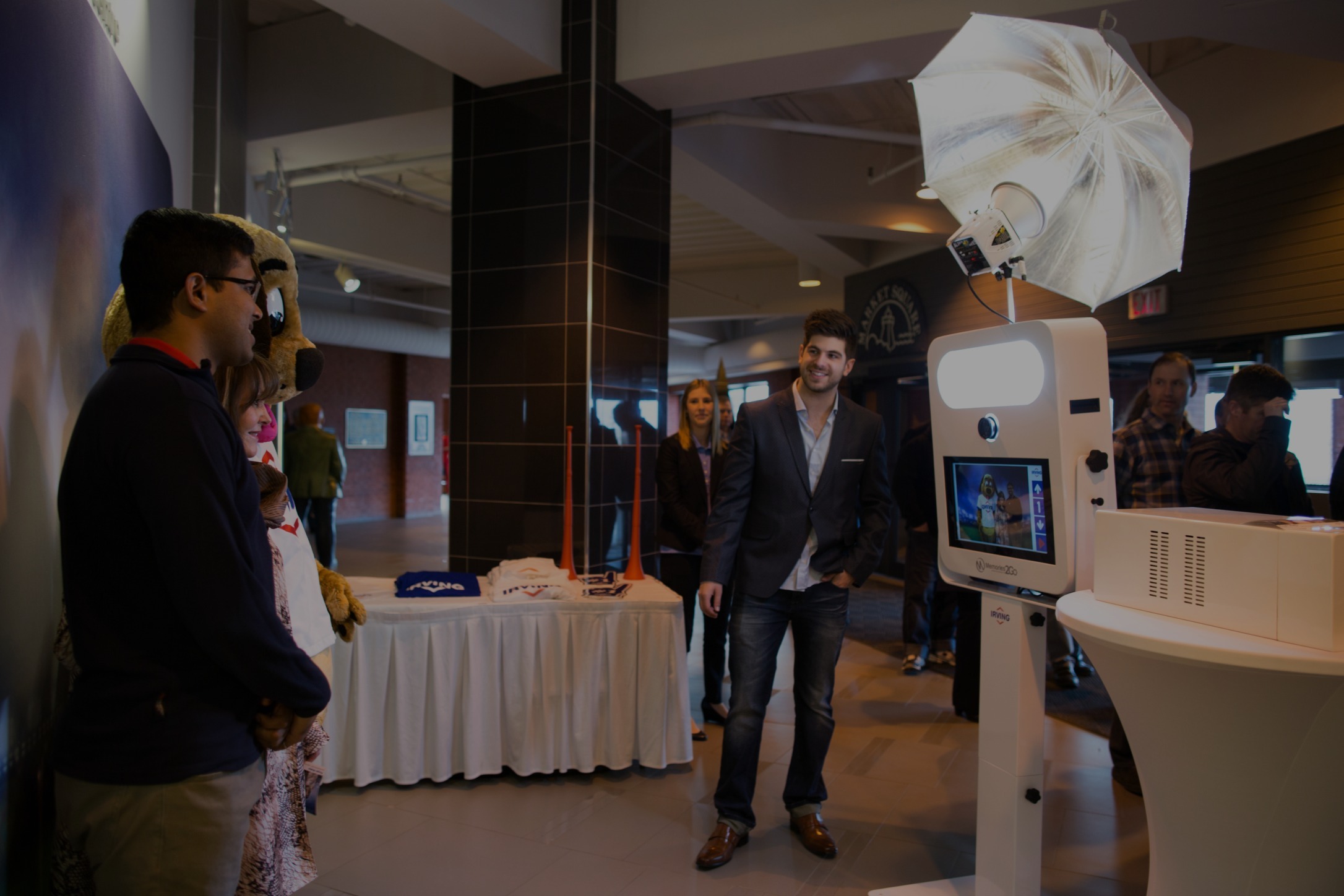 Traditional M2Go photo booth in use at a corporate event